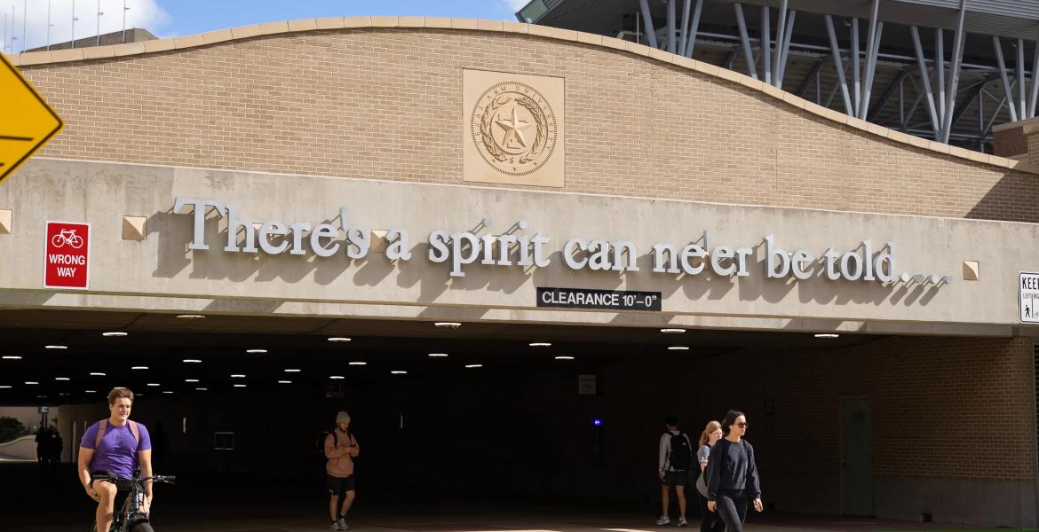 Students walk through a tunnel under Wellborn Road on the Texas A&amp;M University campus in College Station on Nov. 13, 2025.