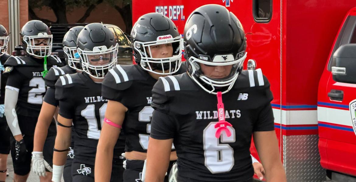 Water Valley football players, led by Branson Lacy (6) walk onto the field before their game against Rankin on Friday, Sept. 4, 2026.