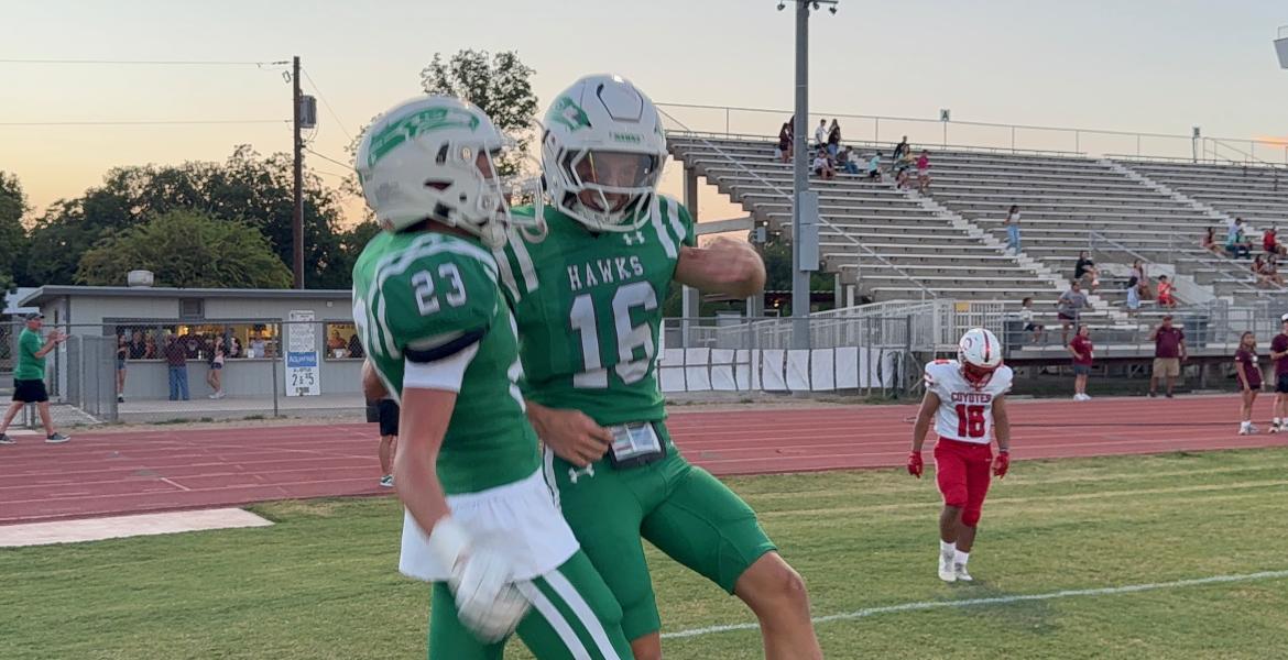 Wall's Sutton Robertson (23) and Nolan Whigham (16) celebrate after a touchdown against La Joya on Thursday, Sept. 3, 2026.
