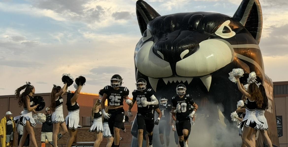 The Water Valley Wildcats run onto the field during the 2026 season.