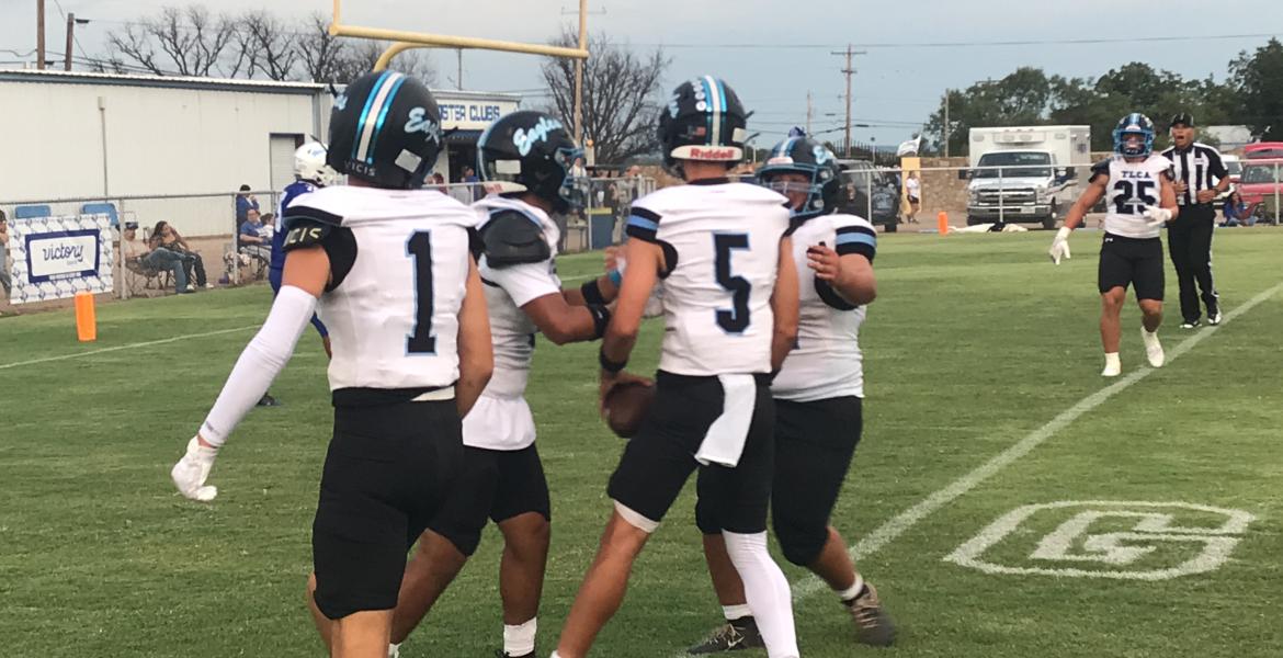 TLCA San Angelo's Justin Reynolds (5) celebrates with teammates after scoring a touchdown against Winters on Thursday, Sept. 10, 2026.