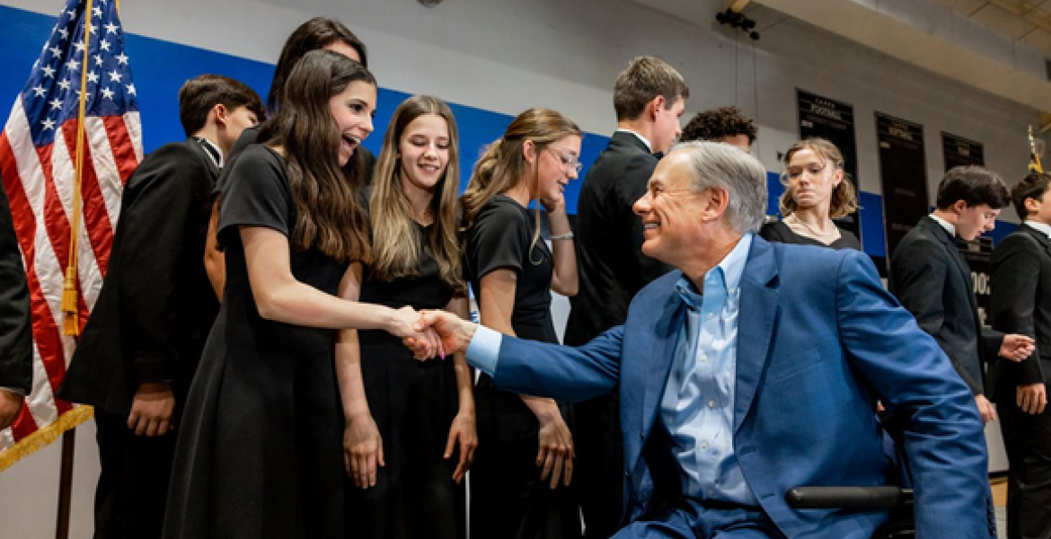 Governor Greg Abbott meets with students.