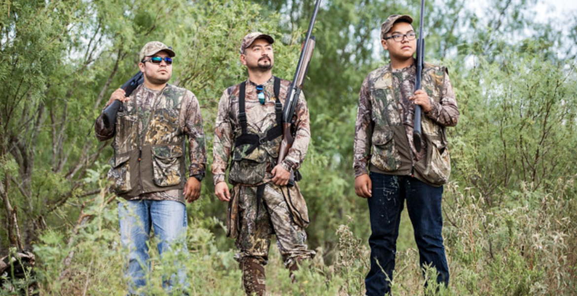 Three people are shown dove hunting.