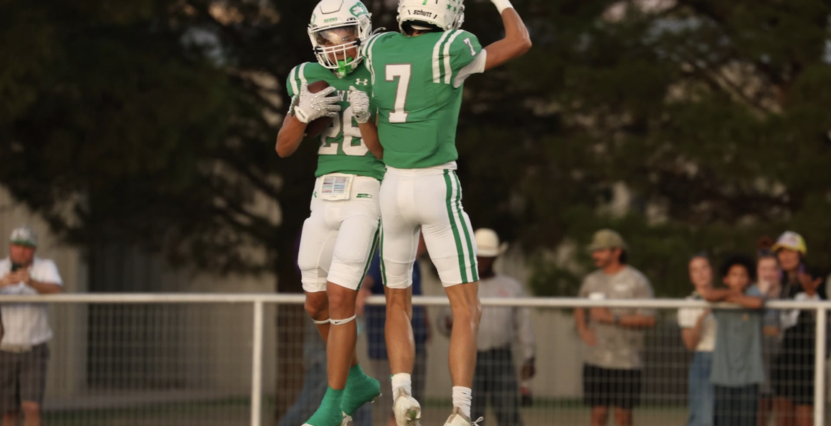 Wall's Hudson Surber (28) celebrates a touchdown catch with Braylon Nelson (7) against Ozona on Friday, Sept. 18, 2025.