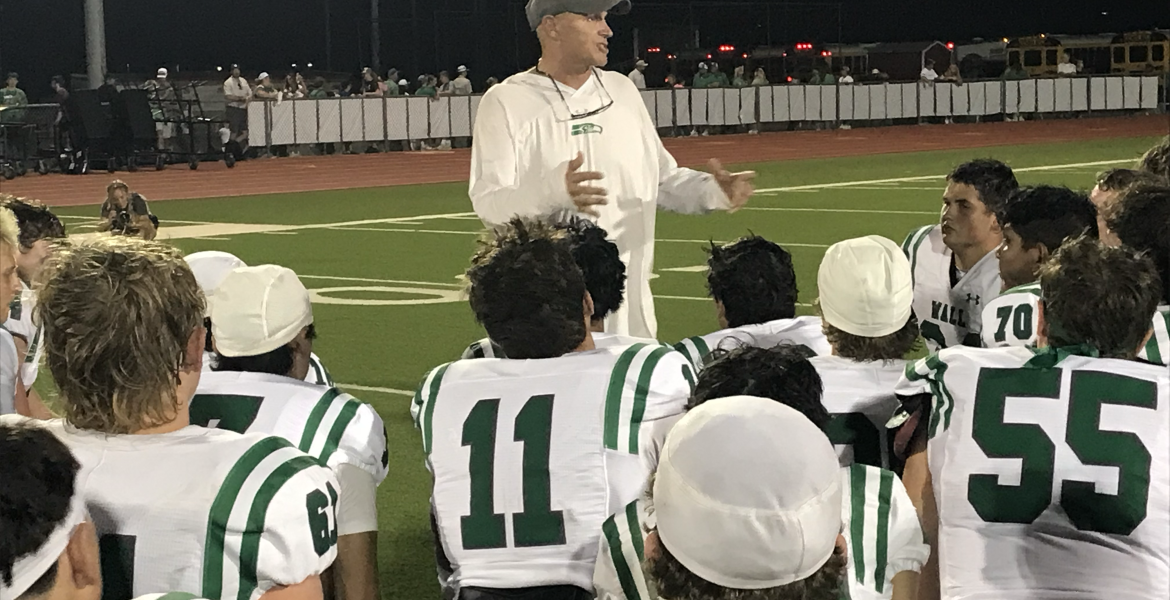 Wall head coach Craig Slaughter talks to his team after the Hawks' 49-13 win over Jim Ned on Friday, Sept. 11, 2026, in Tuscola.