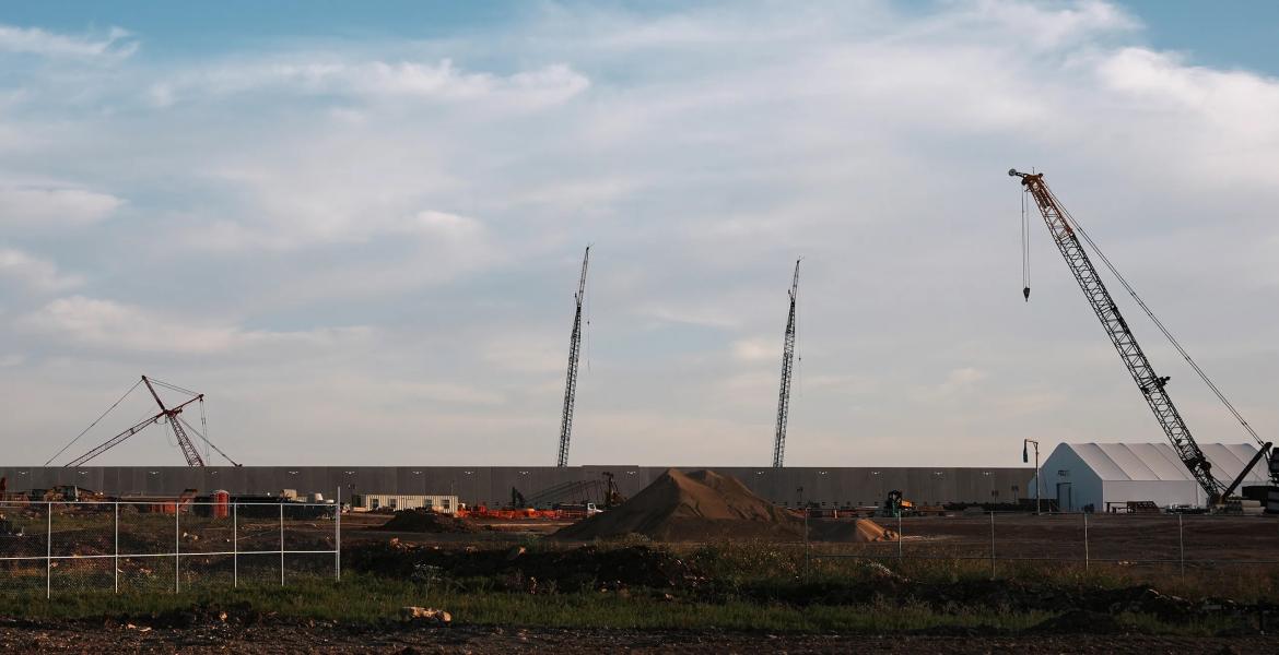 Cranes rise above one of the Google data center buildings under construction in south Haskell County on Aug. 19, 2026.