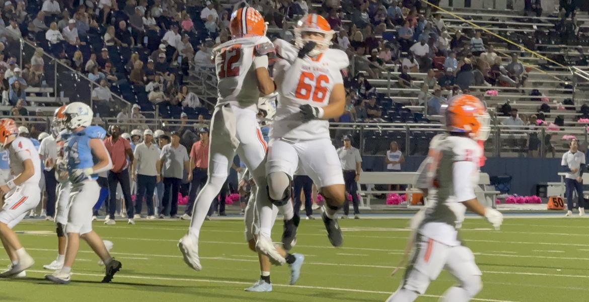 Central Bobcats celebrate a touchdown against Midland Greenwood
